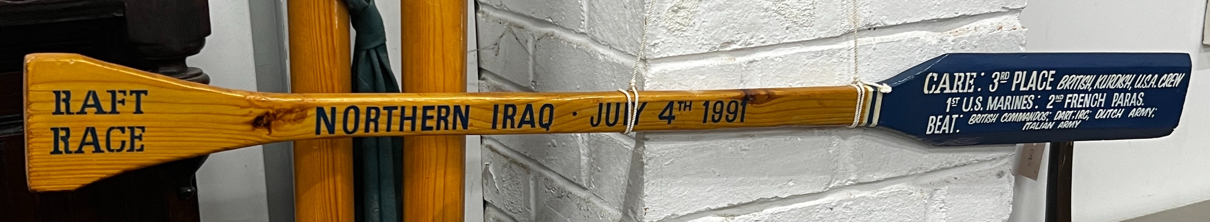 Magdalene College, Cambridge: 2nd Lent Boat 1973 and 4th Lent Boat 1972 presentation rowing oars and a Northern Iraq 1991 military raft race presentation paddle.